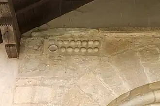 Détail du portail roman (XIIe&nbsp;siècle) de l'église.