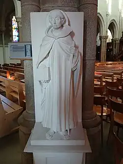Statue de Martin de Vertou réalisée par Jean Guitteny en 1993. Elle est exposée à l'entrée de l'église Saint-Martin-de-Vertou à Vertou.