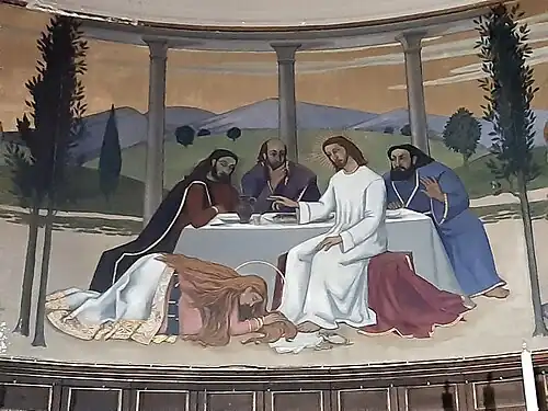 Détail de la fresque du chœur montrant Madeleine essuyant les pieds de Jésus avec ses cheveux après les avoir parfumés