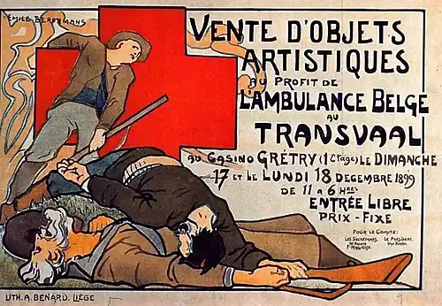 Affiche couleur montrant des ouvriers morts, fusils au poing, devant une croix rouge.