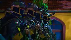 Des opérateurs du 104e RMO lors d'un reportage télévisé.