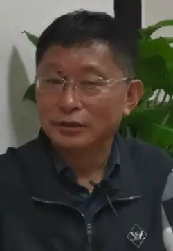 Description de l'image 中国作家协会副主席阿来 (cropped).png.