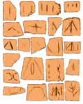 Morceaux de céramique portant des signes semblables à des formes d'écriture.