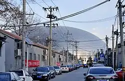 Vers l'Est et le Grand Théâtre National depuis le hutong Dongrongxian. Projets de rénovations en cours en 2019.