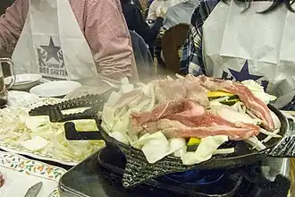 Jingisukan en train de cuire.