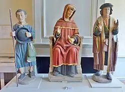 Chapelle Saint-Mélar de Locmélar: saint Yves entre le riche et le pauvre (exposition au château de Kerjean en 2013).