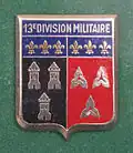 Insigne de la 13e&nbsp;DMT à Tours, dont dépendait le 32e&nbsp;RID.