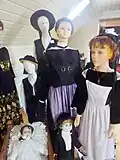 Costumes d'enfants dirinonais au début du XXe&nbsp;siècle (Musée de Dirinon).