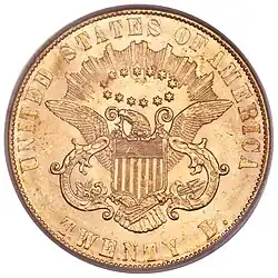 Pièce de monnaie en or avec un aigle héraldique, tenant un ruban avec l'inscription E PLURIBUS UNUM, au centre, surmonté de treize étoiles en ovale, et les isncriptions UNITED STATES OF AMERICA ET TWENTY D.