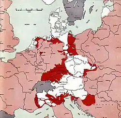 Carte en couleur de l'Europe montrant l'avancée des troupes Alliées (en rouge foncé) en Allemagne et en Europe..
