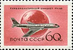 timbre rouge, représentant un Tu-110 posé devant un globe terrestre.