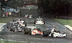 Description de l'image 1975 Italian GP - A group at the Mirabello chicane.jpg.