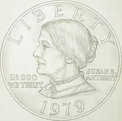 Dessin d'une pièce de monnaie représentant le profil gauche d'une femme et les inscriptions Susan B. Anthony, Liberty, In God We Trust et 1979.