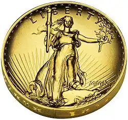 Pièce de monnaie avec une femme en robe longue, portant un flambeau dans sa main droite et un rameau dans la gauche et l'inscription LIBERTY au-dessus d'elle.