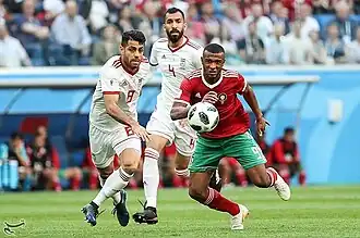 El Kaabi en duel face à Morteza Pouraliganji.