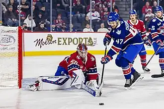 Photographie couleur d'un joueur de hockey sur glace