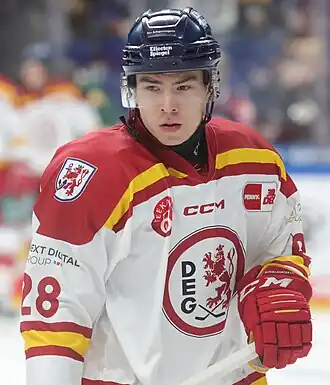 Photographie couleur d'un joueur de hockey sur glace