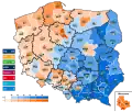 Élections locales polonaises de 2024 aux assemblées régionales (circonscriptions) - PiS (bleu), KO (orange).