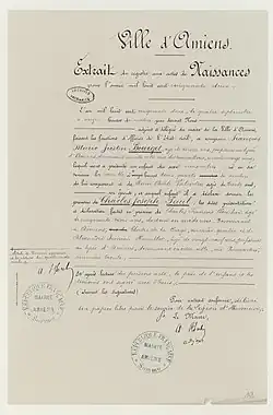 Extrait d'acte de naissance ancien écrit à l'encre.