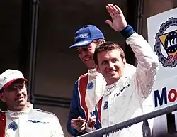 Description de l'image 2nd in GTS class (12th overall) - Tommy Archer, Marc Duez & Justin Bell - Chrysler Viper GTS-R - on the podium at the 1999 Le Mans (51897115443).jpg.