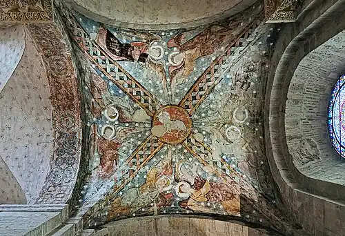 Fresque de l'agneau pascal en face de la chapelle du Crucifix.