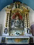 Plougasnou : église paroissiale Saint-Pierre, intérieur, retable de la confrérie du Rosaire (date de 1668)