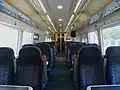 L'aménagement en classe standard d'une rame Class 375 Electrostar Southeastern, montrant l'habillage des sièges de couleur grise.