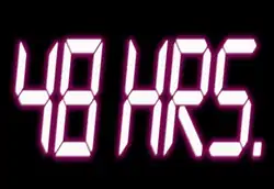 Affichage digital indiquant le texte "48 HRS." en rose clair sur fond noir