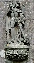 Église paroissiale Saint-Milliau : statue de l'archange Saint-Michel tuant le dragon.