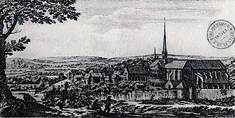 Gravure en noir et blanc d'une église monumentale entourée de bâtiments monastiques