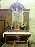 Autel et retable de la Vierge.