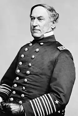 Portrait photographique de David Farragut en 1886, de trois-quart face.