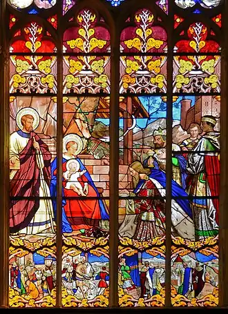 Vitrail de la chapelle Saint Joseph représentant l'Adoration des mages ainsi que les étapes précédant et suivant leur arrivée à Bethléem (XIXe&nbsp;siècle).