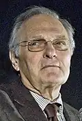 Alan Alda incarne Alan Fitch