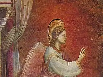 Détail de fresque. Un halo composé de rayons rouges émane de l'ange tourné vers la droite.