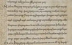 Extrait d'une page de manuscrit rédigée en petits caractères noirs.