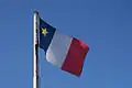 Drapeau de l'Acadie à Archigny, en France.