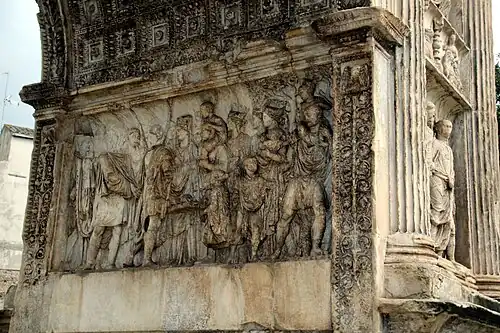 Création à Bénévent, en 101, de l'institutio alimentaria, à l'intention des enfants pauvres. Pilier est.