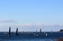 Les concurrents au départ de Brest devant le phare du Petit Minou.