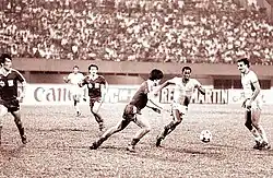 Photo sepia du match entre la Chine et l'Arabie saoudite en 1984