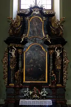 Autel latéral droit dessiné par Antal Eberhardt (1768), dédié à saint François Sauveur. La peinture centrale de Franz Wagenschön