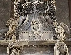 Christ au tombeau, encadré par des Anges.