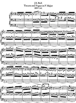 Partition à trois portées.