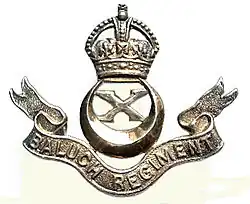 Insigne du 10e régiment baloutche avec la couronne Tudor.