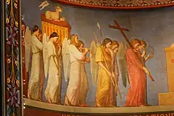 À gauche : procession coté évangiles