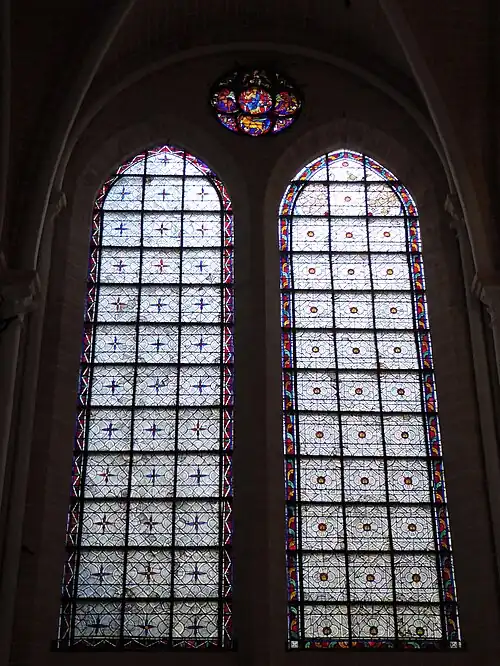 Baie 27Grisaille, au-dessus de la sacristie.