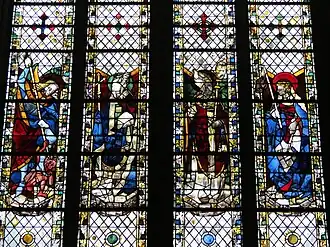 Photo d'un détail de la baie 49 figurant des saints