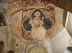 Christ en gloire portant un globe dans sa main gauche et entouré du tétramorphe.