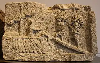 Bas-relief représentant un navire de commerce en cours de chargement