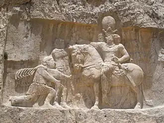 Triomphe de Shapur Ier devant les empereurs Valérien et Philippe l'Arabe (relief de Naqsh-e Rostam).